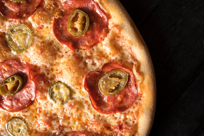 Truffle Burrata pizza with mushrooms and arugula